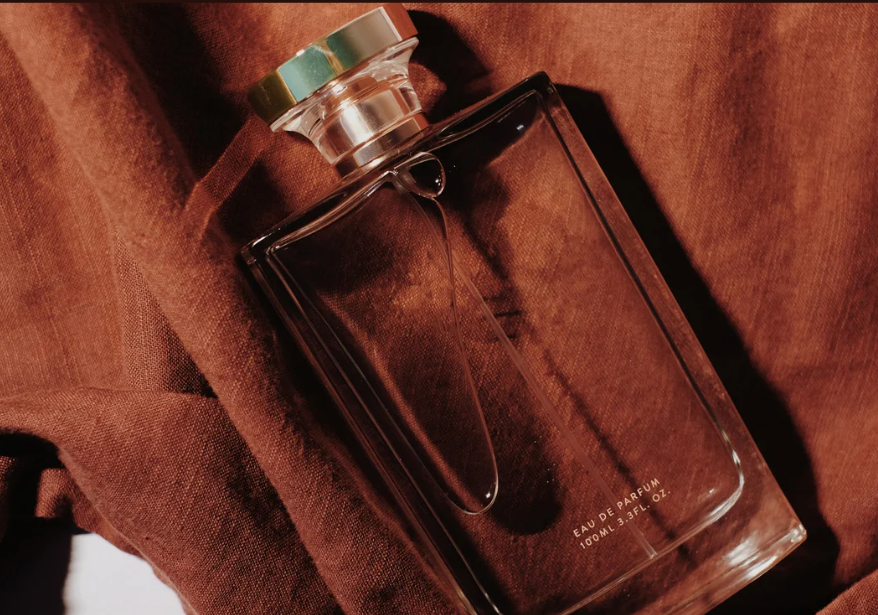 Vanilla Mist premium perfume bottle with warm brown tones by FragMend